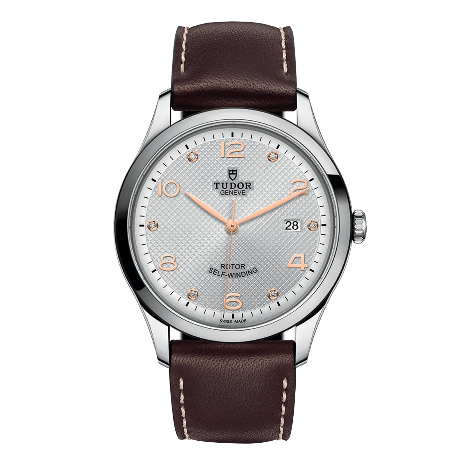 The TUDOR 1926 is a classic wristwatch featuring a silver dial, gold hour markers, mechanical movement, date at 3 o’clock, brown leather strap, and stainless steel case.