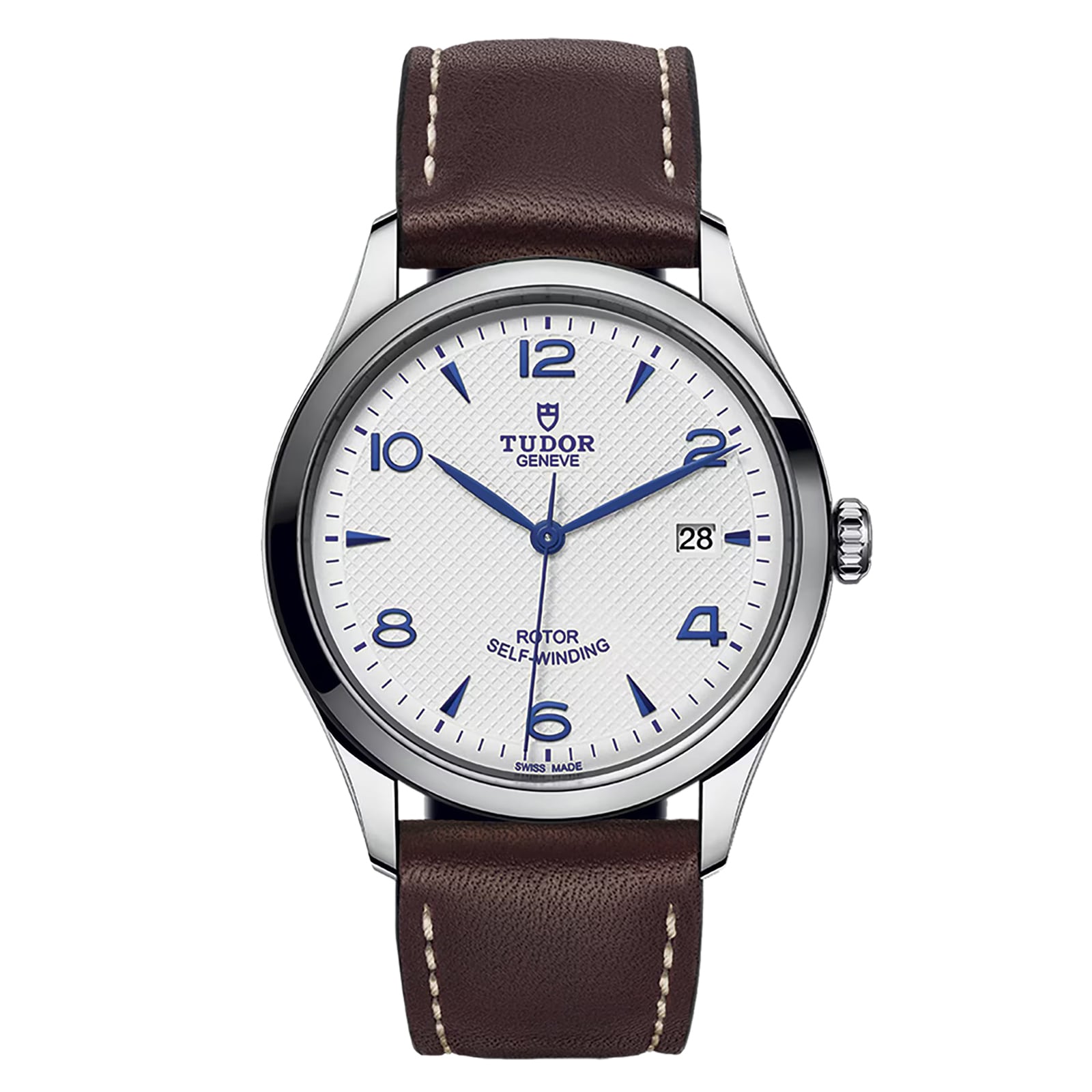 The TUDOR 1926 features a white textured dial with blue Arabic numerals, date at 3 o’clock, and a brown leather strap with white stitching—timeless elegance that embodies the classic appeal of TUDOR watches.
