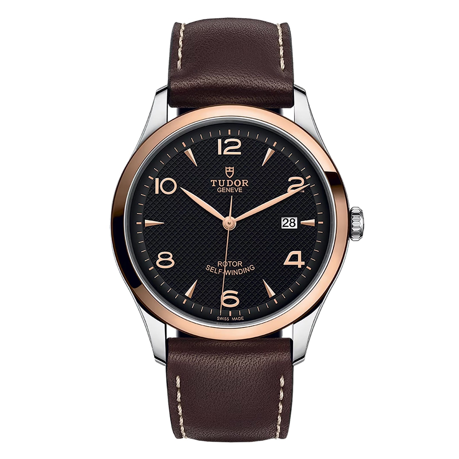 The TUDOR 1926 wristwatch features a brown leather strap, black dial, rose gold bezel, and a date display at 3 o’clock.