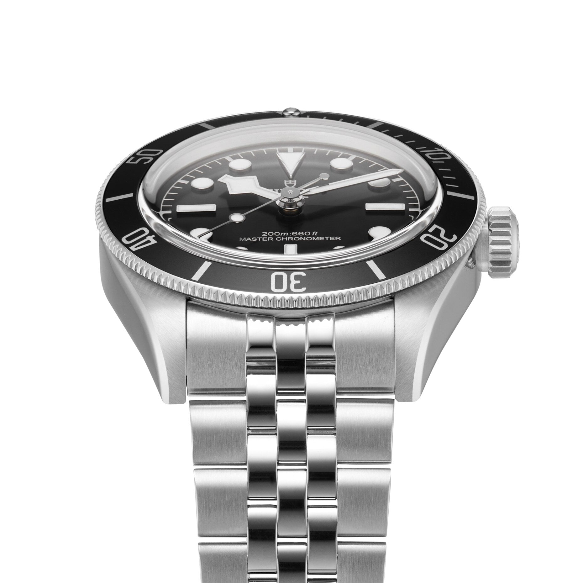 A TUDOR Black Bay watch in stainless steel with a black bezel, black dial, metal bracelet, and the time set to 10:10.