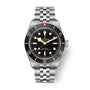 Tudor Black Bay 58 watch with stainless steel bracelet, black dial, gold hands and indices, and black rotating bezel.