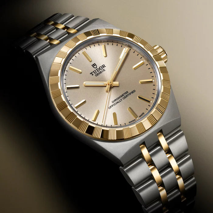 TUDOR Royal watch with silver and gold two-tone case, cream dial, and matching bracelet.