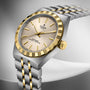 TUDOR Royal watch with two-tone steel and gold bezel, cream dial, gold applied indices, and matching two-tone bracelet.