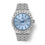 Steel TUDOR Royal watch with light blue dial, blue hour markers and hands, date window, and matching steel bracelet.
