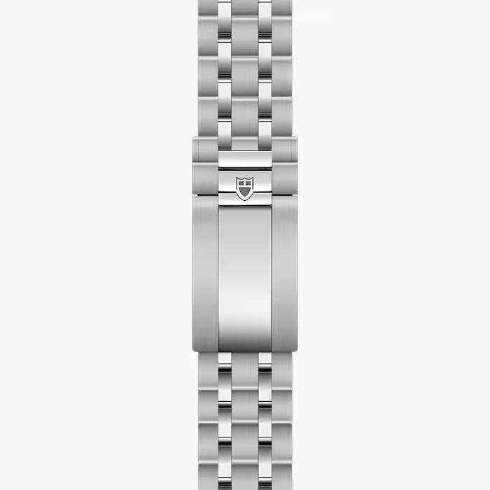 Stainless steel watch bracelet with linked metal segments and shield-shaped clasp.