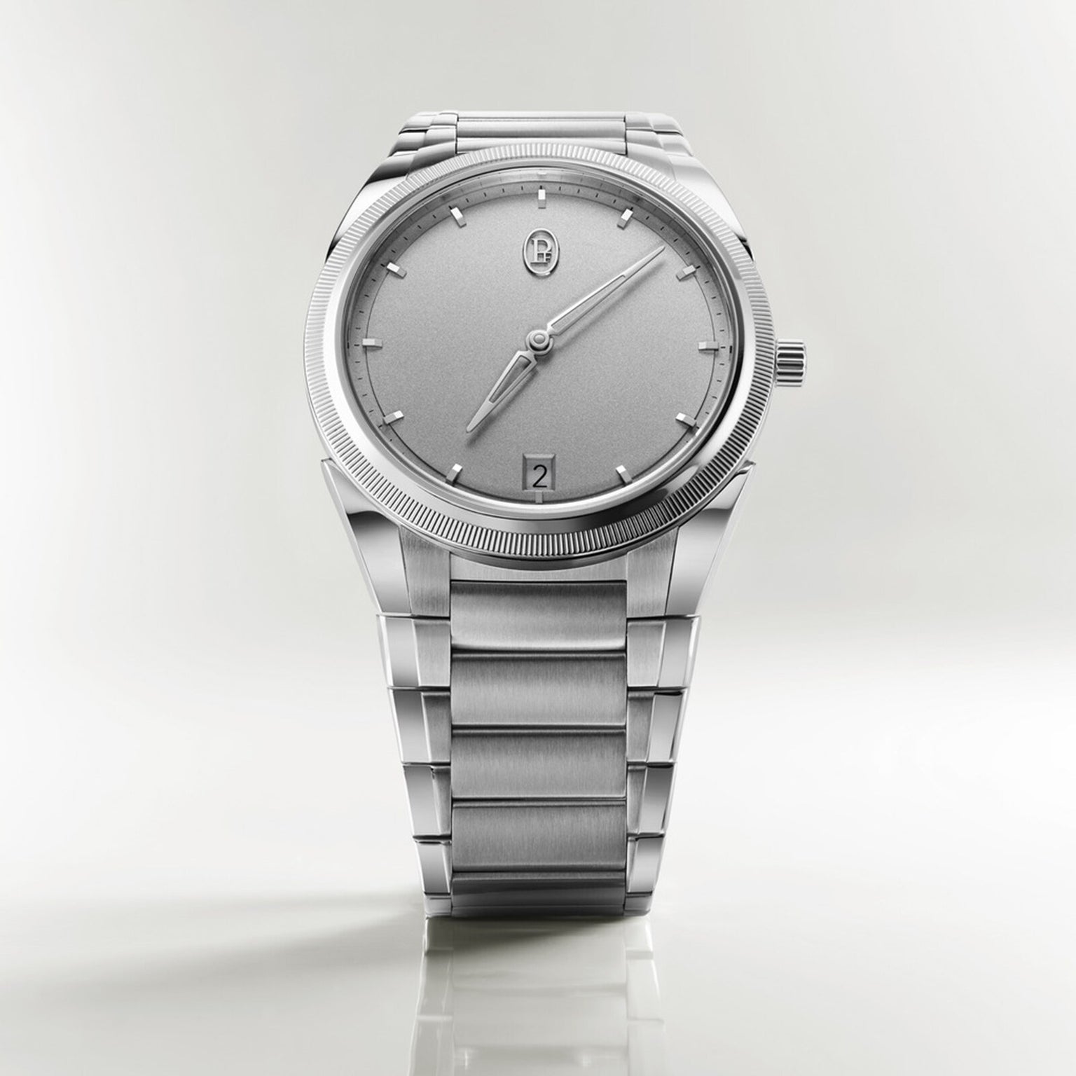 The Parmigiani Fleurier TONDA PF Micro-Rotor is a silver luxury wristwatch featuring a minimalist design, metal bracelet, and round face, displayed on a plain background.