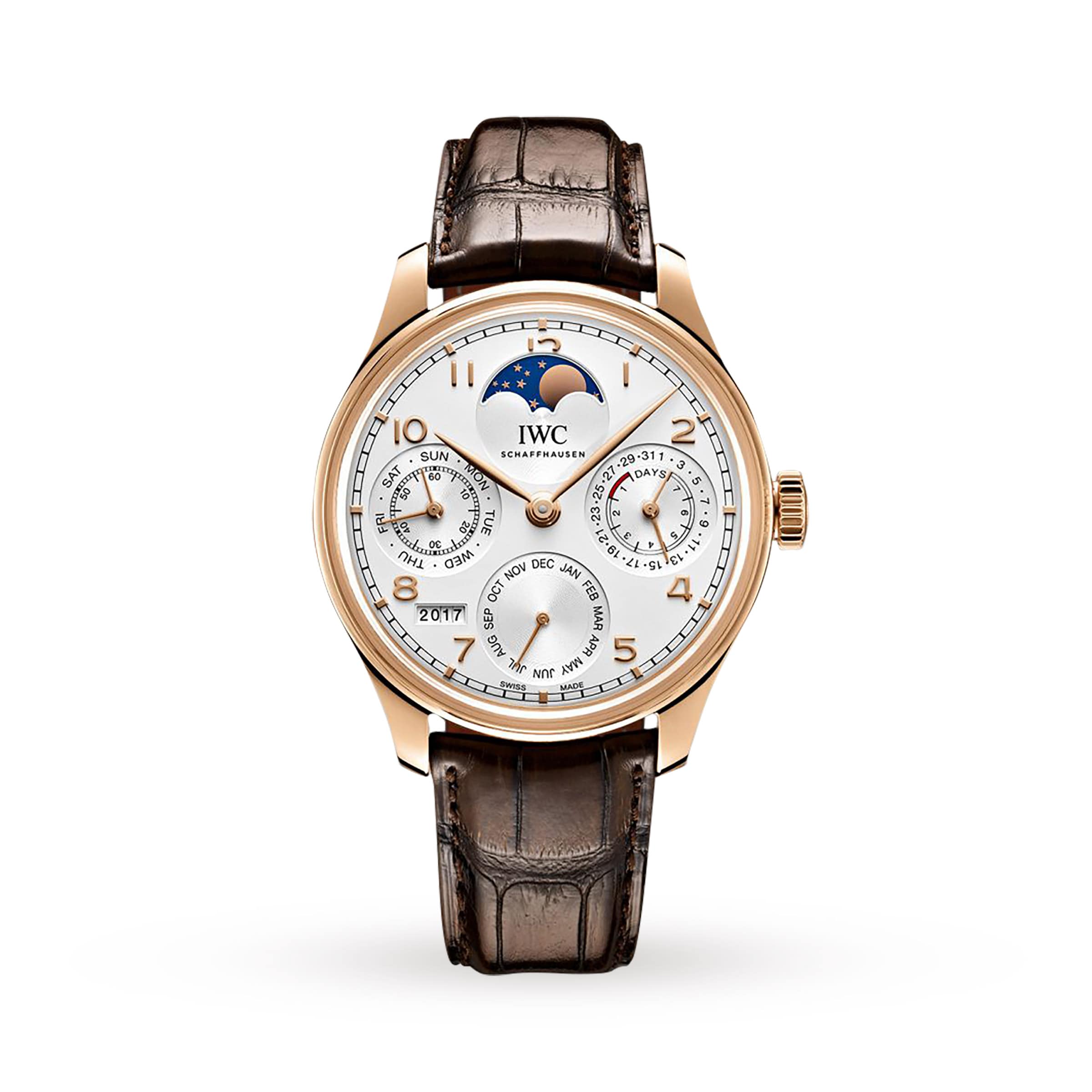 The IWC Schaffhausen Portugieser Perpetual Calendar is a gold wristwatch with an 18ct gold case, brown leather strap, white dial, moon phase display, and subdials for day, date, month, and year.