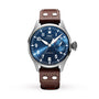 The IWC Schaffhausen Big Pilots Watch Edition Le Petit Prince features a stainless steel case, blue dial with white numerals, brown leather strap, automatic movement, and day-date display.