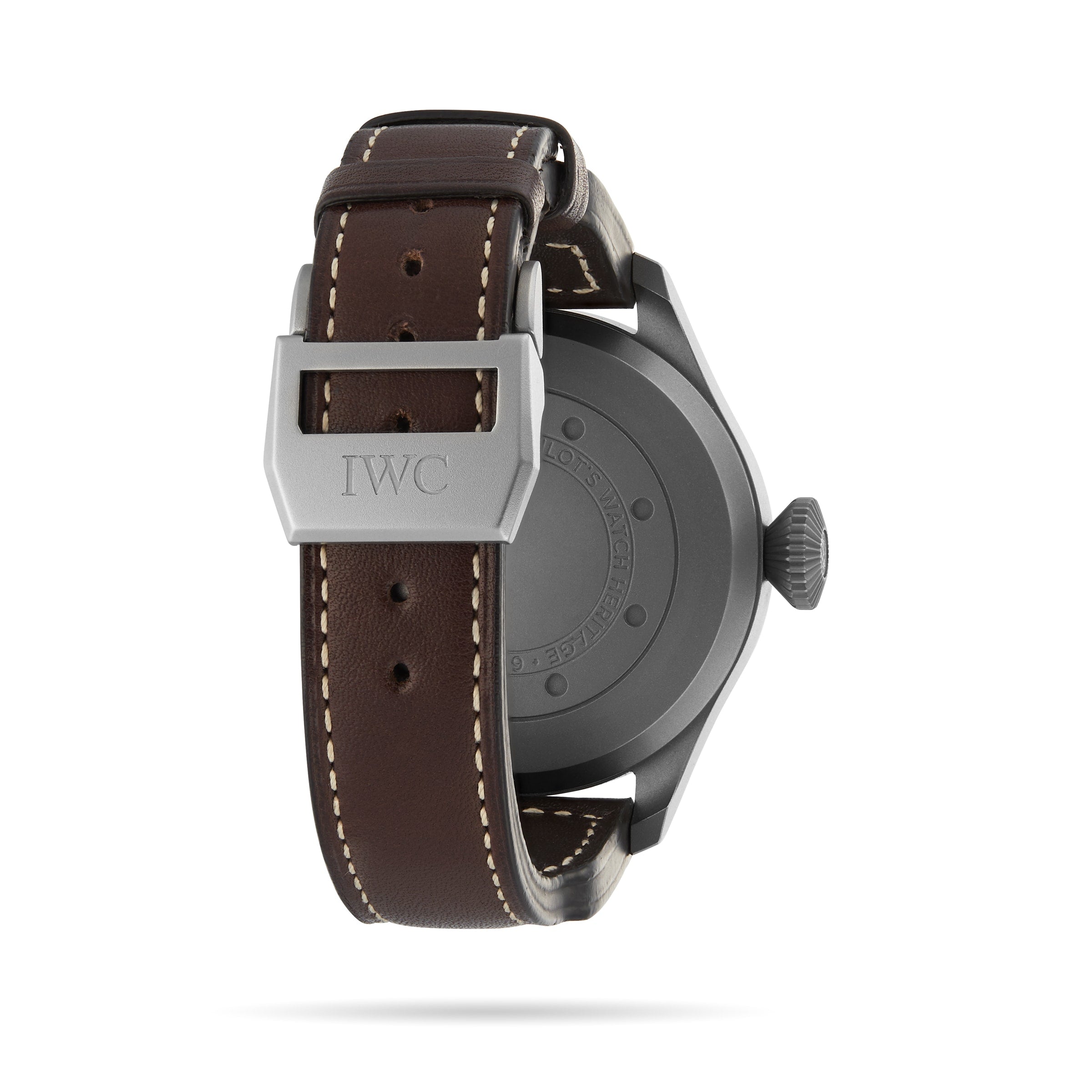The Big Pilots Watch Heritage by IWC Schaffhausen is shown from the back, featuring a brown leather strap with white stitching, a silver IWC-engraved buckle, and a sturdy titanium case against a white background.