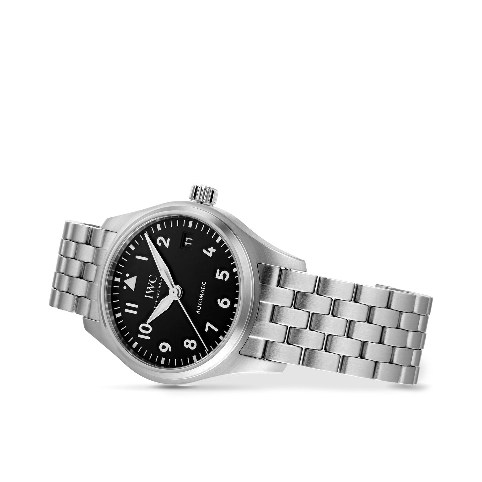 The IWC Schaffhausen Pilots Watch Automatic 36, with a stainless steel case, black dial with white numerals, and metal bracelet, is shown at an angle against a white background.