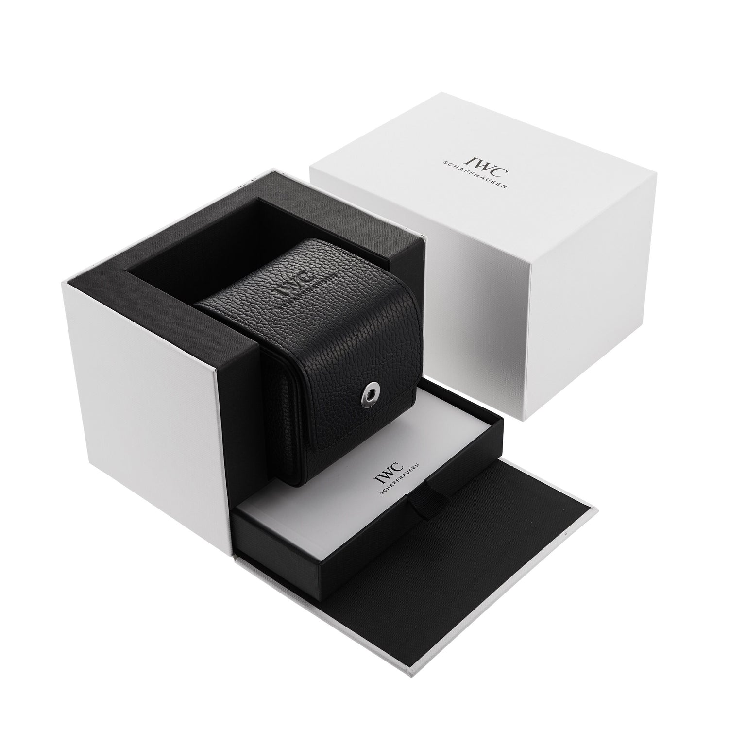 A black textured watch case with the IWC Schaffhausen logo sits inside an open white box, ideal for storing the Pilots Watch Automatic 36, with a separate lid placed alongside.