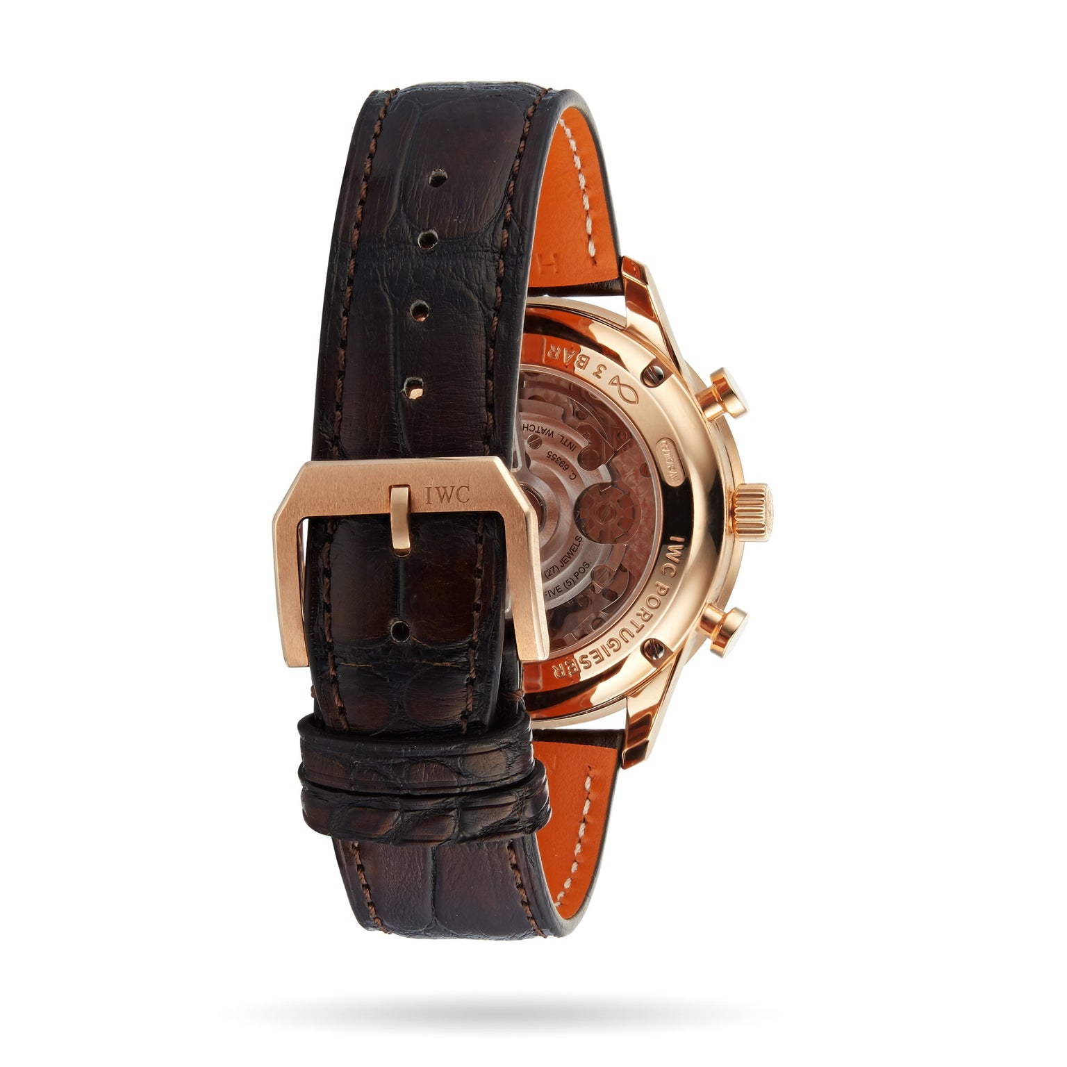 The IWC Schaffhausen Portugieser Chronograph features a rose gold case, brown leather strap, and an exhibition back revealing its intricate inner mechanism.