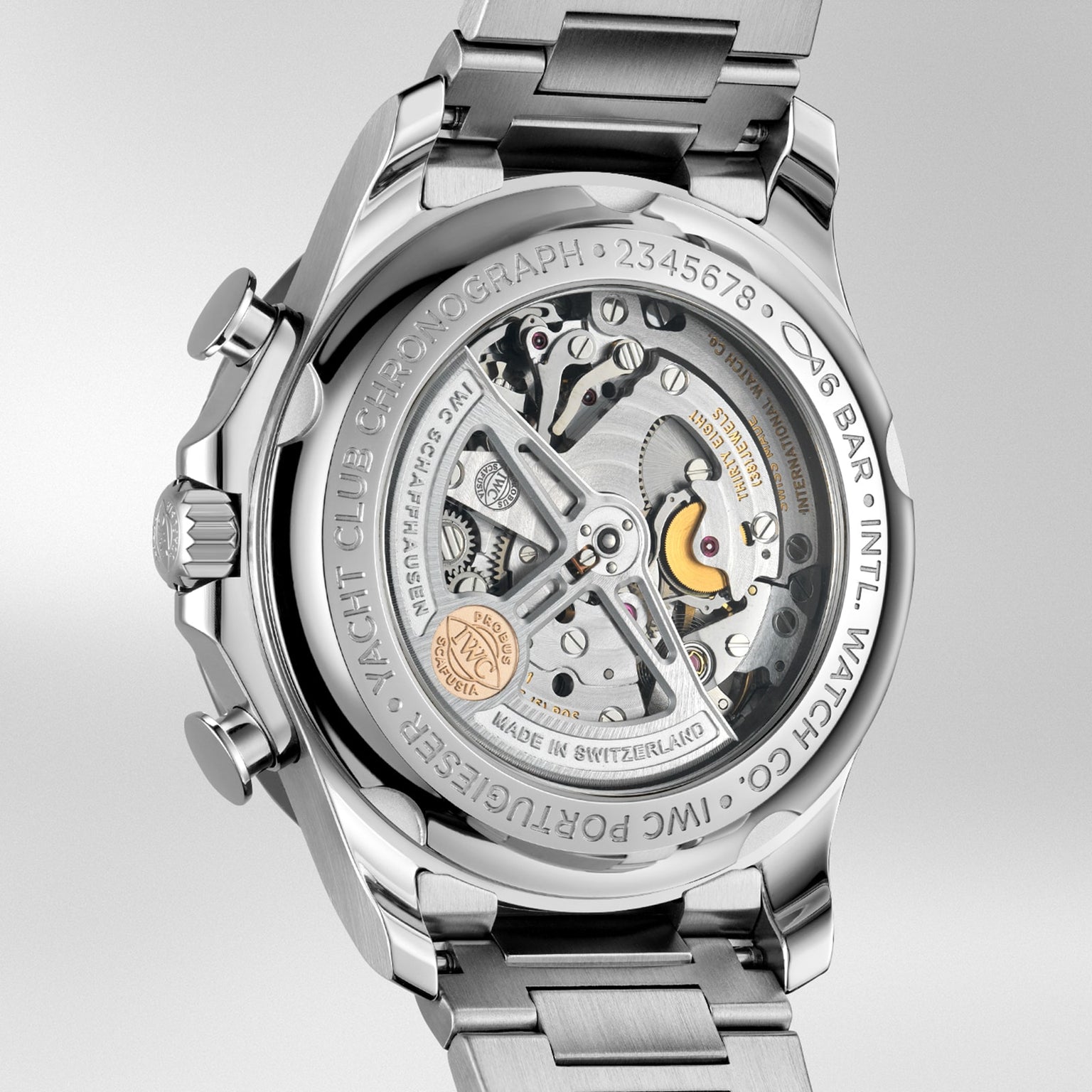 Close-up of the back of the IWC Schaffhausen Portugieser Yacht Club Chronograph, highlighting its exposed mechanical movement, engraved case, and stainless steel bracelet—a striking display of nautical sports watch craftsmanship.