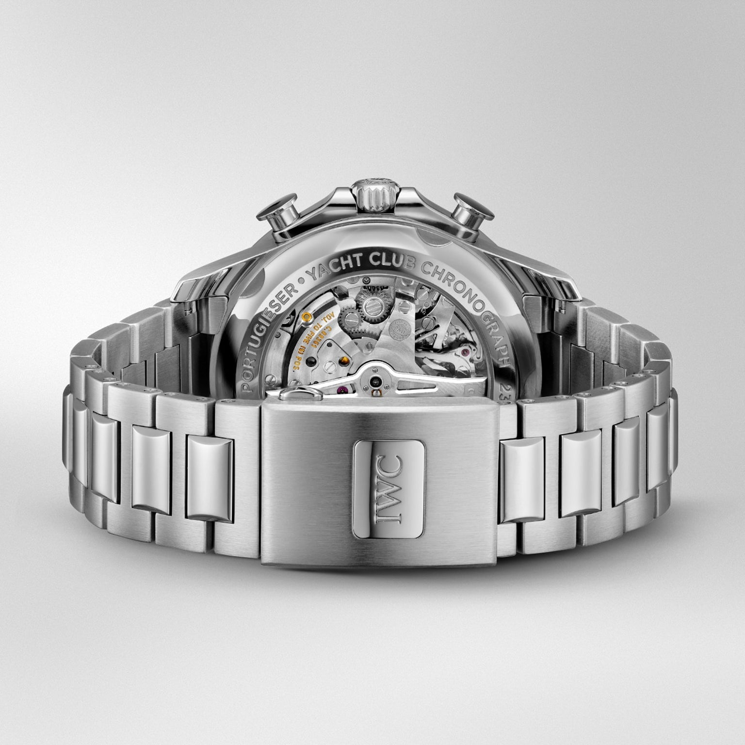 The IWC Schaffhausen Portugieser Yacht Club Chronograph features a stainless steel case, open caseback displaying the movement, IWC engraved on the clasp, and Yacht Club Chronograph on the caseback—highlighting its nautical heritage.