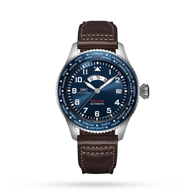 The IWC Schaffhausen Pilots Watch Timezoner Edition Le Petit Prince features a blue dial, automatic movement, brown leather strap, stainless steel case, white numerals, city names on the bezel, and a date window at 3 o’clock.