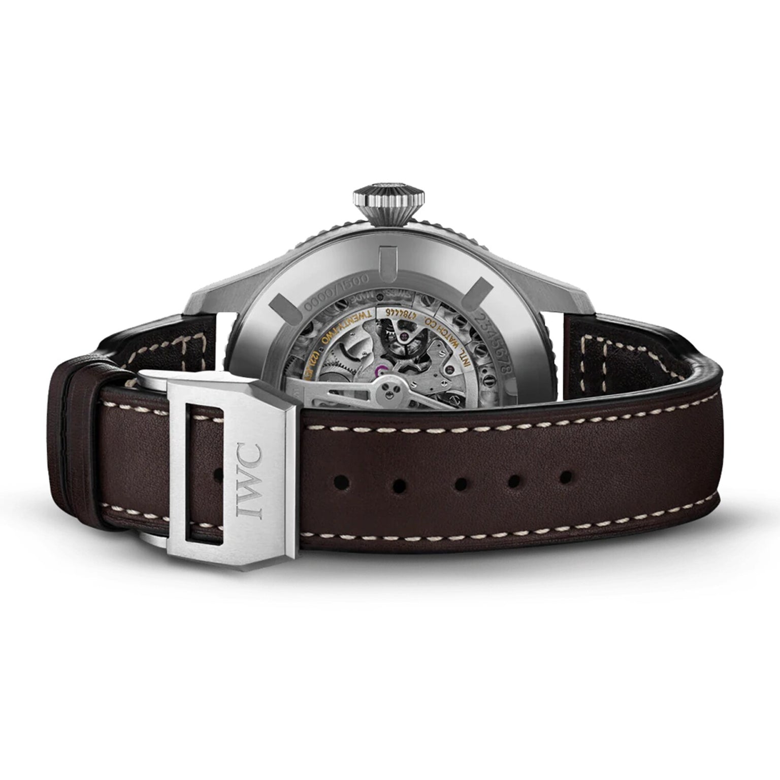 A close-up of the IWC Schaffhausen Pilots Watch Timezoner Edition Le Petit Prince shows its blue dial, visible mechanics, brown leather strap with white stitching, stainless steel case, and silver buckle engraved with IWC.