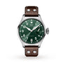 The IWC Schaffhausen Big Pilots Watch features a stainless steel case, green dial with white numerals, date display, and a brown leather strap with two rivets near the lugs, along with an impressive 7-day power reserve.