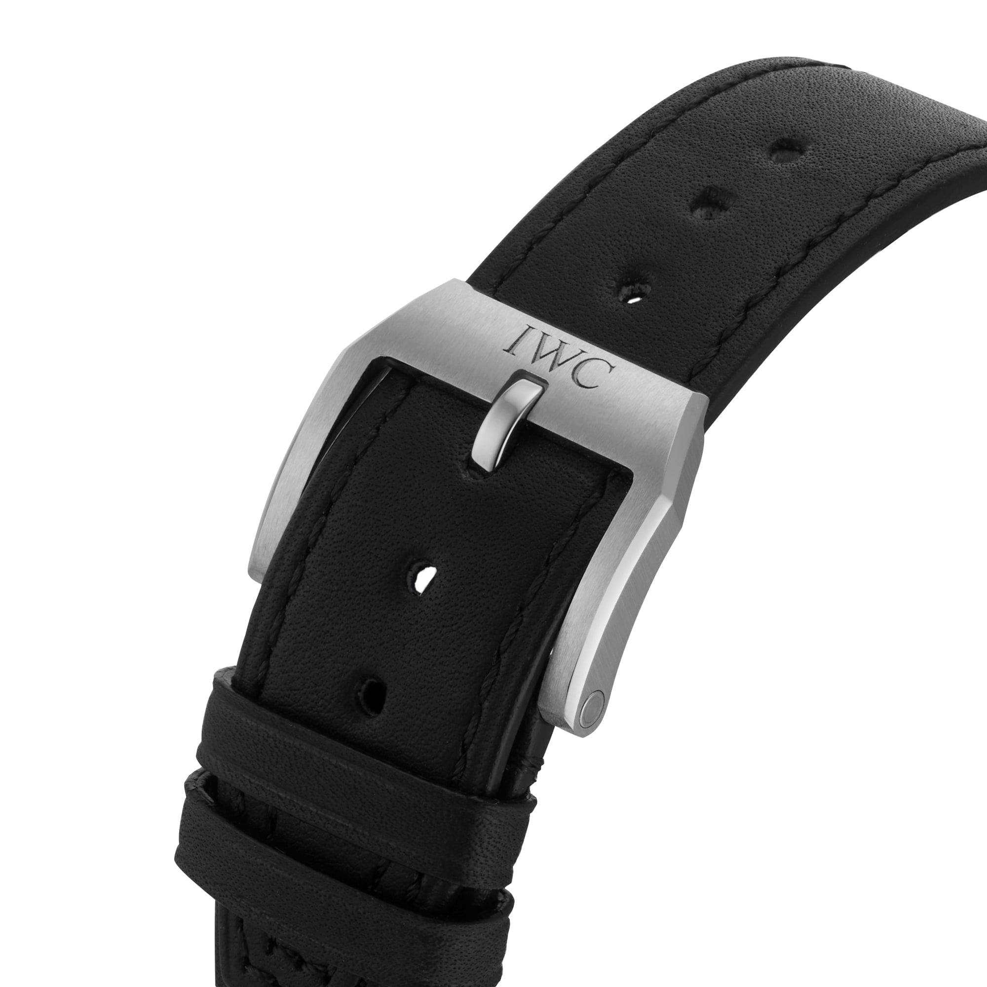 Close-up of a black leather strap with a silver buckle engraved with IWC, attached to the IWC Schaffhausen Pilots Watch Mark XX featuring a stainless steel case.