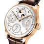 The IWC Schaffhausen Portugieser Perpetual Calendar 44 is a rose gold wristwatch with a white dial, brown leather strap, and displays for date, month, day subdials, plus a moon phase perpetual calendar.