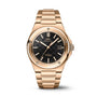 The IWC Schaffhausen Ingenieur Automatic 40 showcases an 18-carat gold case, black textured dial with gold markers, date at 3 o’clock, and a matching gold bracelet for a refined look.