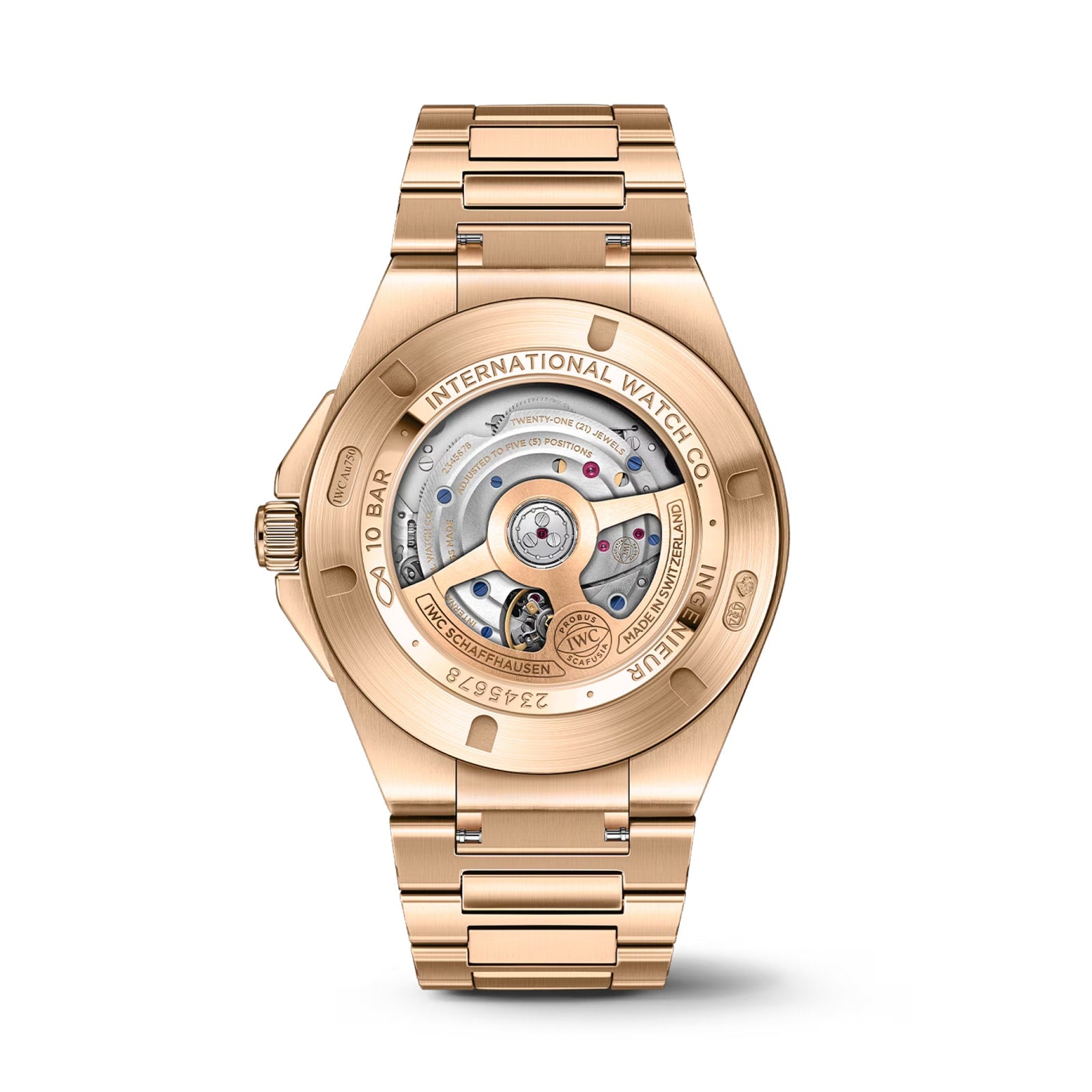 The image shows the back of the IWC Schaffhausen Ingenieur Automatic 40, crafted in 18-carat gold, with a transparent case displaying its internal mechanical movement and intricate components.