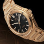 The IWC Schaffhausen Ingenieur Automatic 40 boasts an 18-carat gold case, black textured dial, luminescent hands and markers, plus a date window at 3 oclock on a sleek black background.