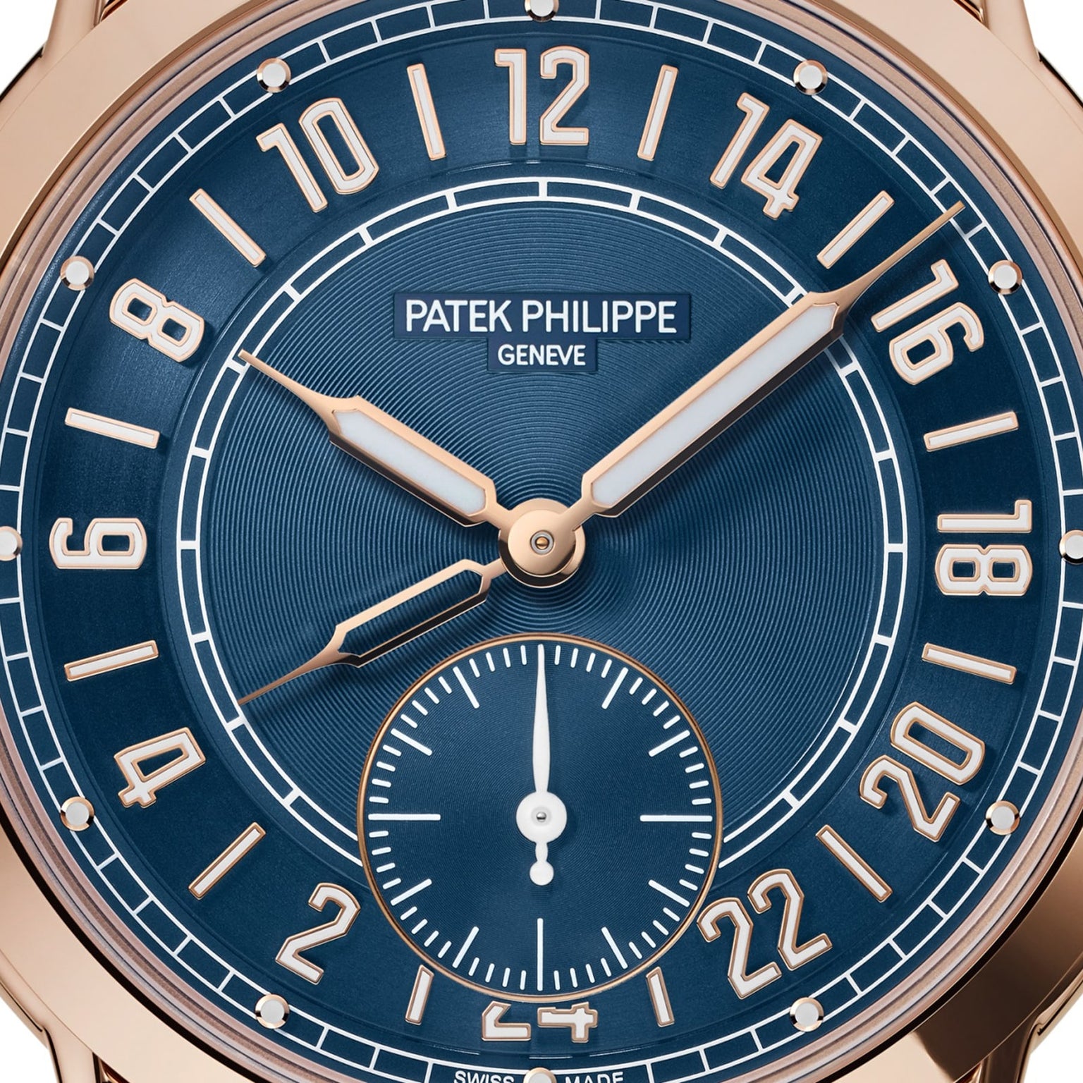 Close-up of the Patek Philippe Complications 5224R-001 watch face with gold hands and numerals, displaying the time 8:20.