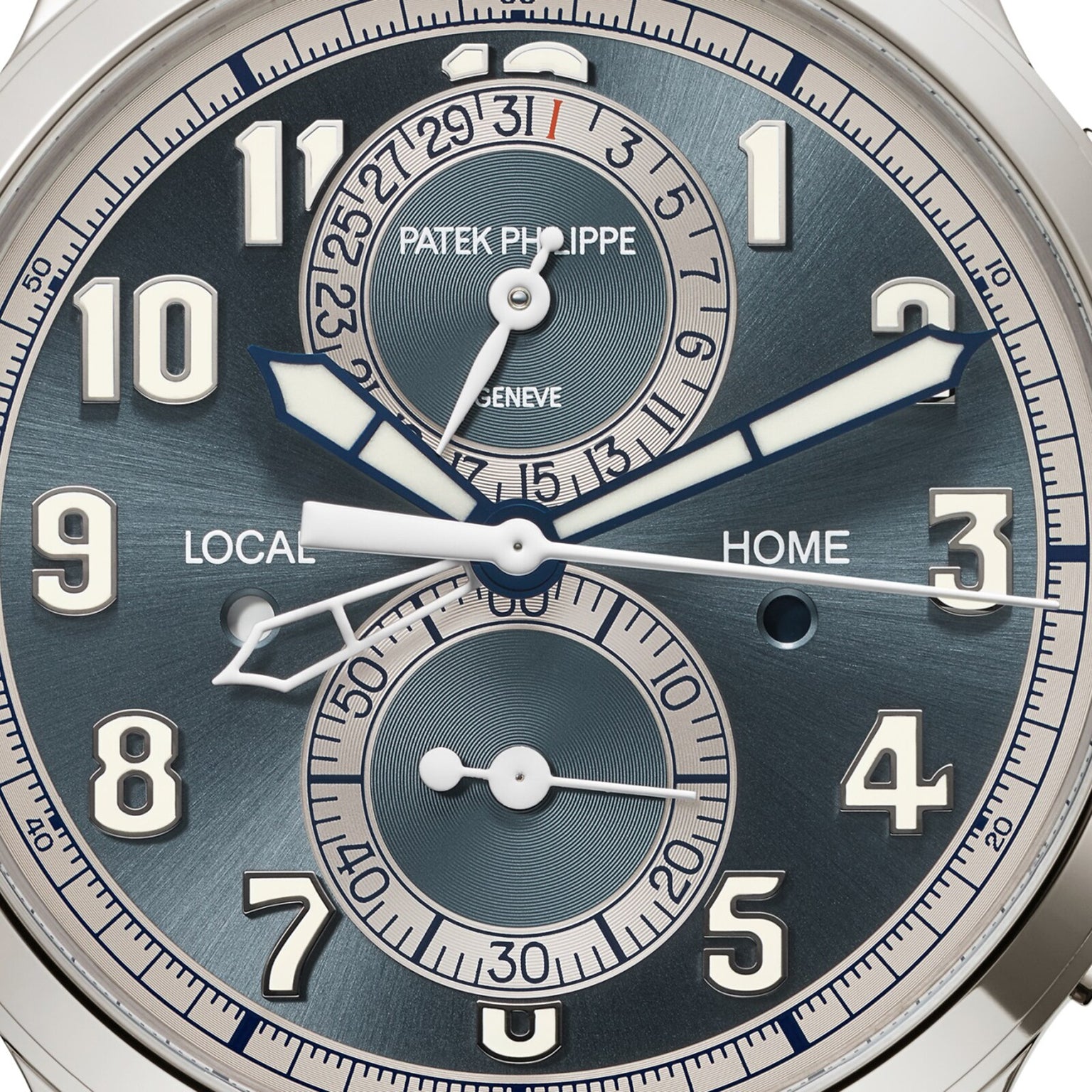 Close-up of the Patek Philippe Complications 5924G-001 watch face in blue, featuring multiple dials, silver numerals, and bold hands.
