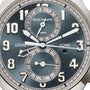 Close-up of the Patek Philippe Complications 5924G-001 watch face in blue, featuring multiple dials, silver numerals, and bold hands.
