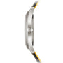 Side view of the Patek Philippe Calatrava 6007G-001 wristwatch featuring a silver case, crown, and a black strap with yellow edges.