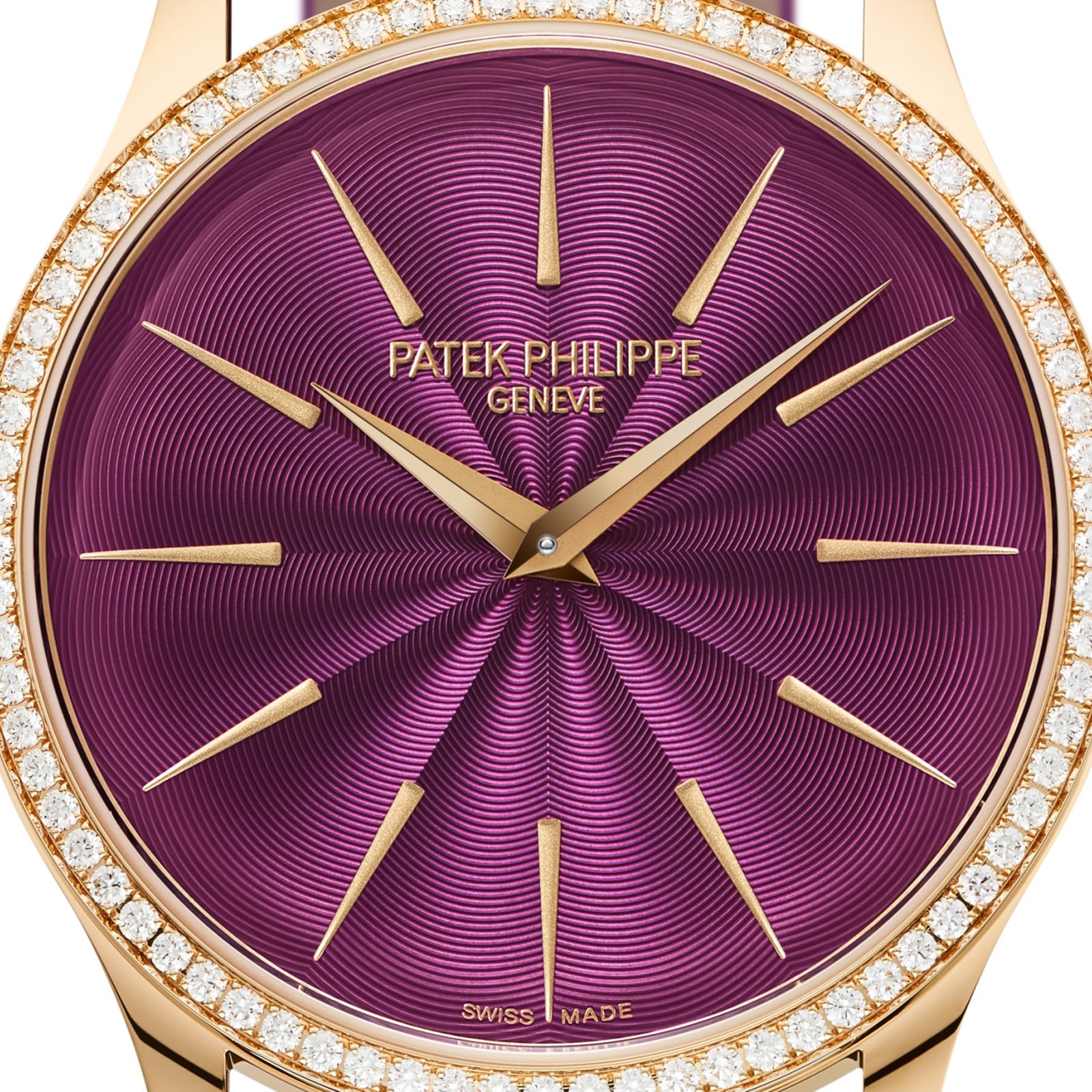 Close-up of the Patek Philippe Calatrava 4997/200R-001 watch featuring a purple dial, gold markers, and a diamond-set bezel.