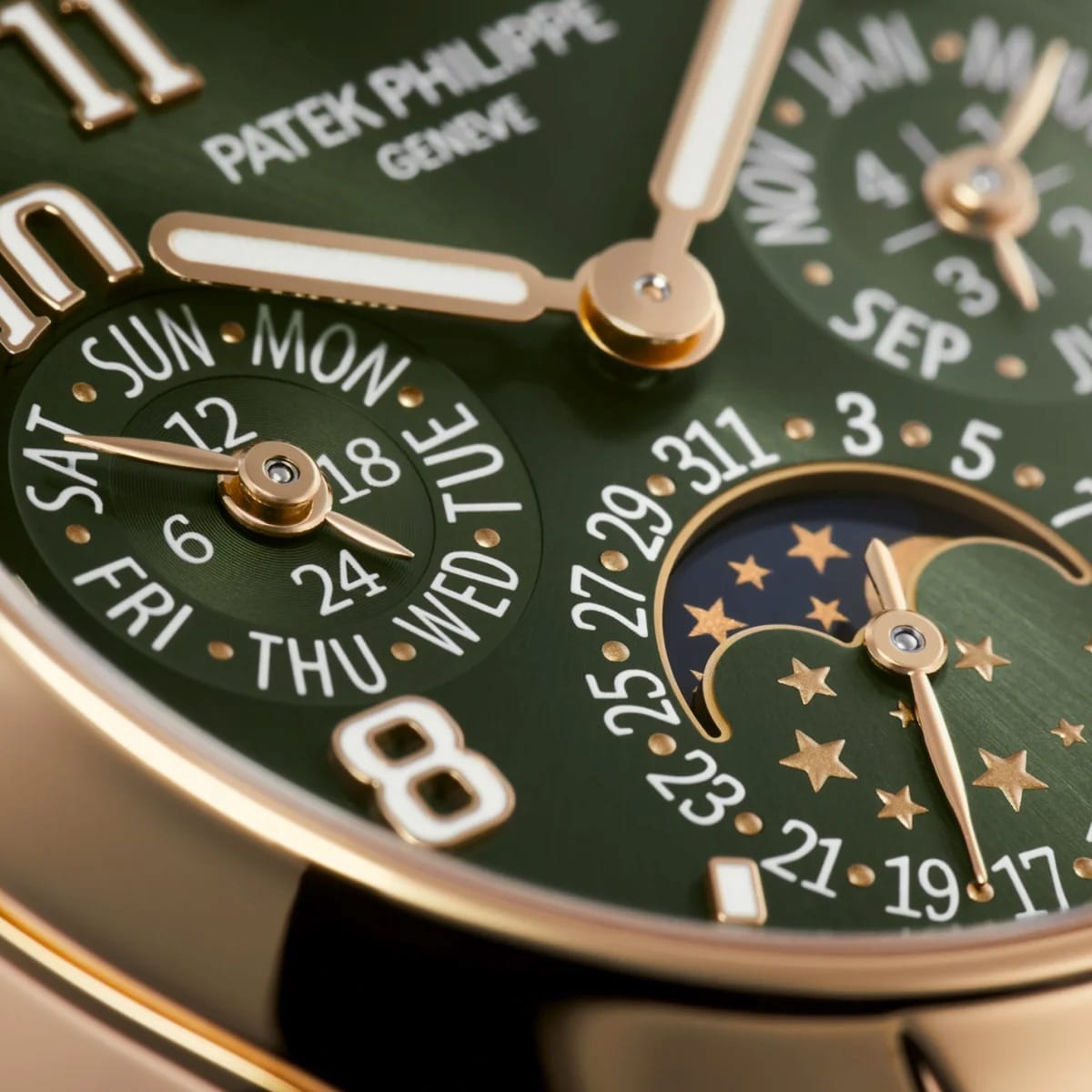 Close-up of the Patek Philippe Twenty~4 7340/1R-010 watch face in green, displaying days, dates, and moon phase details.