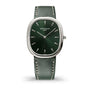 Patek Philippe watch with green face and leather strap on a white background