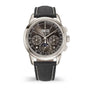 Luxury watch with black strap and detailed face on a white background