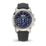 Luxury watch with blue face and black strap on white background