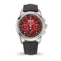 Luxury watch with red face and black strap on white background