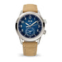 Watch with blue dial and beige leather strap on a white background