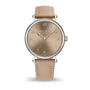 Watch with beige strap and brown dial on a white background