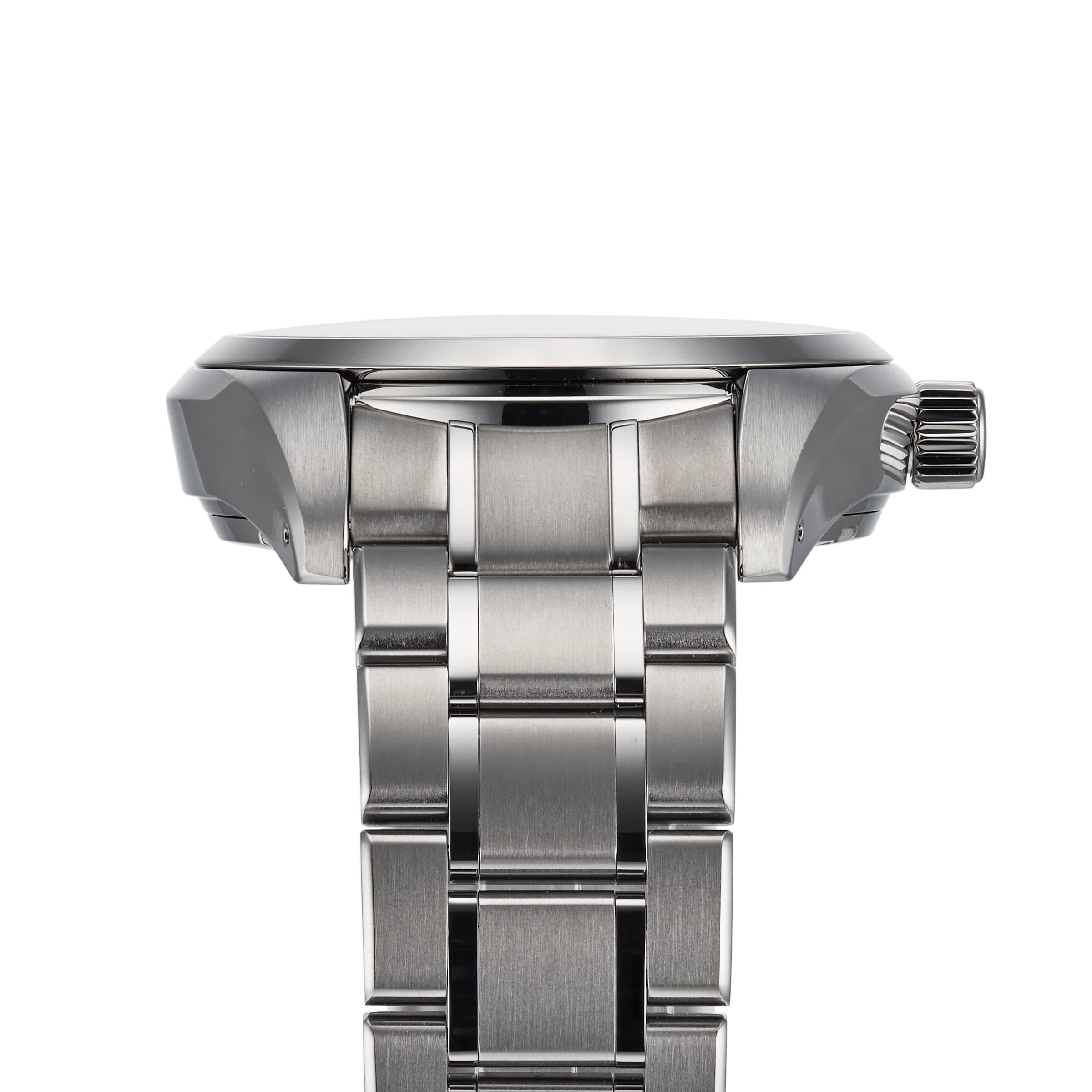 Side view of the Grand Seiko Spring Drive Heritage wristwatch with a titanium case, metal band, and a ridged crown on the right side.