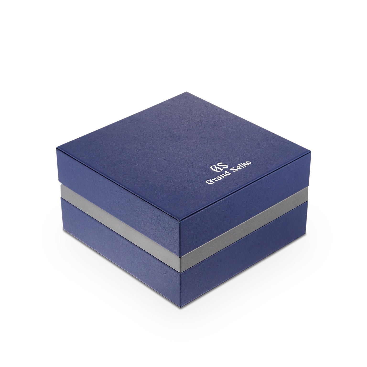 A square, dark blue Grand Seiko gift box with a silver stripe and the logo on the lid—ideal for presenting the Grand Seiko Spring Drive Heritage timepiece.