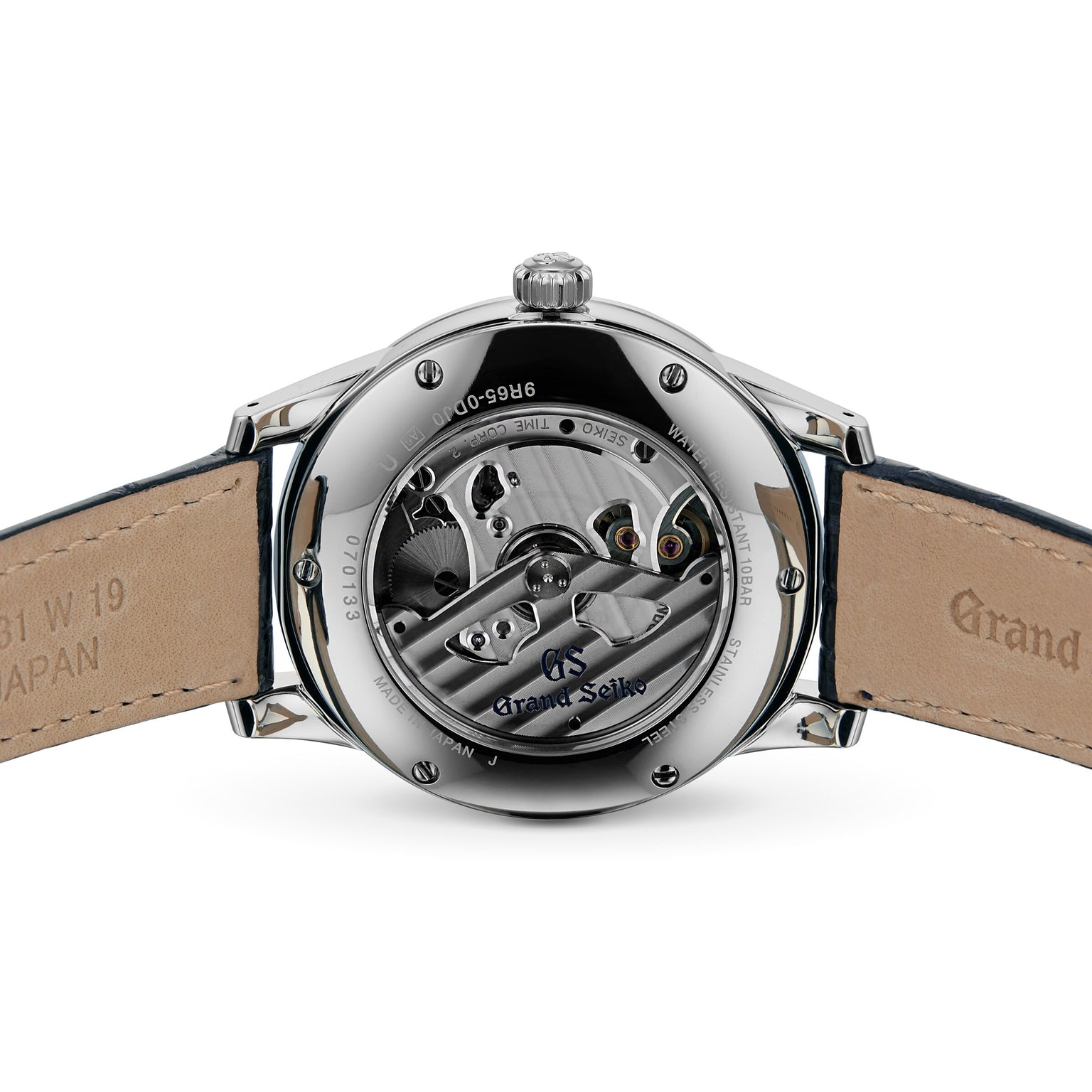 Close-up of the back of the Grand Seiko Spring Drive Elegance, showcasing its exposed Spring Drive movement through a transparent caseback in polished stainless steel.