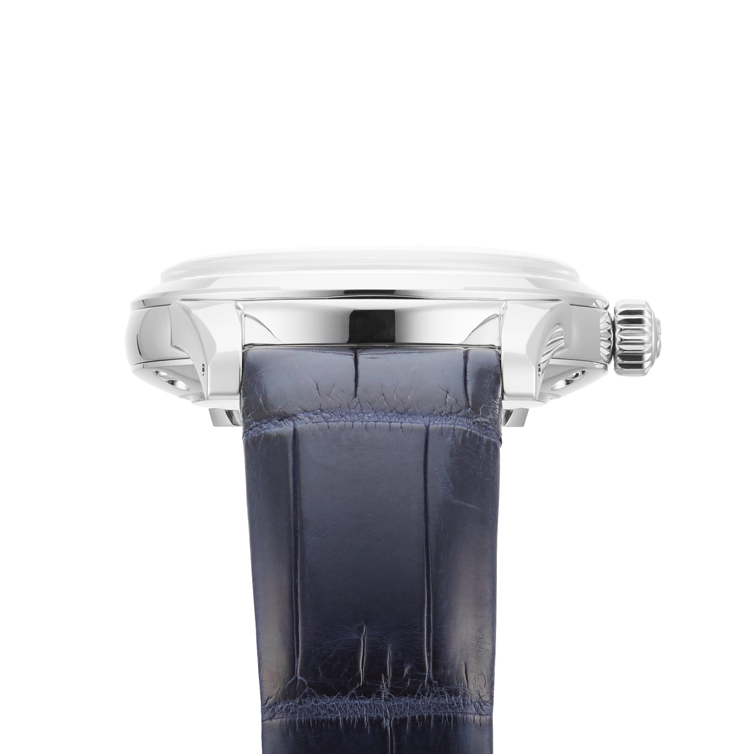 Close-up side profile of the Grand Seiko Manual Elegance, showcasing a silver case and dark blue leather strap, powered by the precise Caliber 9S64 movement.