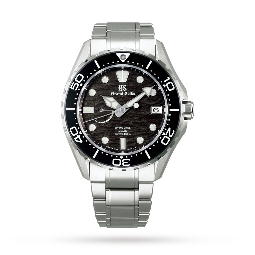 The Grand Seiko Spring Drive GMT Evolution 9 features a textured black dial inspired by Japanese nature, bold white hour markers, date at 3 o’clock, black unidirectional bezel, and stainless steel bracelet.