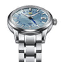The Grand Seiko Automatic GMT Elegance features a stainless steel case, light blue dial with silver hour markers, blue GMT hand, date display, Calibre 9S66 movement, and comes on a metal bracelet.