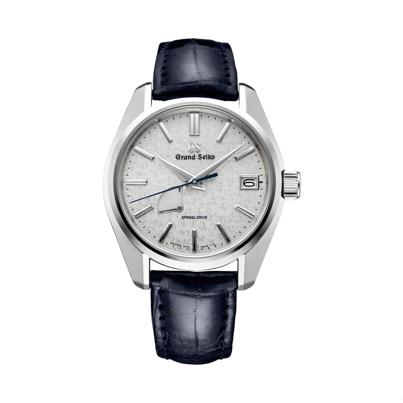 The Grand Seiko Spring Drive Heritage features a textured silver dial, blue second hand, date window, and black leather strap.