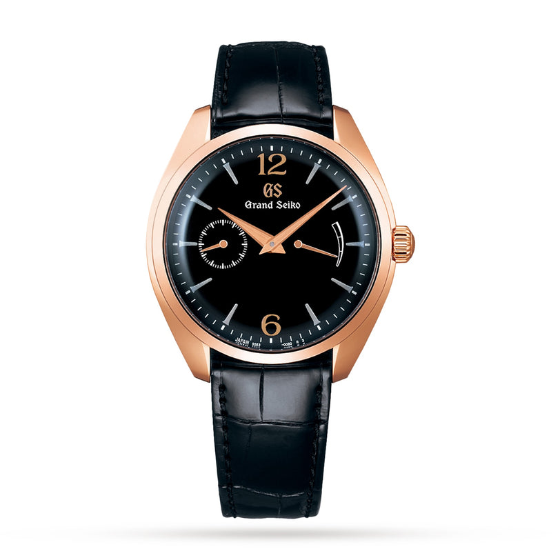 The Grand Seiko Manual Elegance features a black Urushi lacquer dial, rose gold case, black leather strap, sub-dial at 9 o’clock, power reserve at 3 o’clock, and is powered by the precise Caliber 9S63 movement.