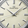 Close-up of a Grand Seiko Manual Elegance watch face featuring silver hour markers and hands on a cream dial, displaying 10:08:36 and powered by the precise 9S64 mechanical calibre movement.