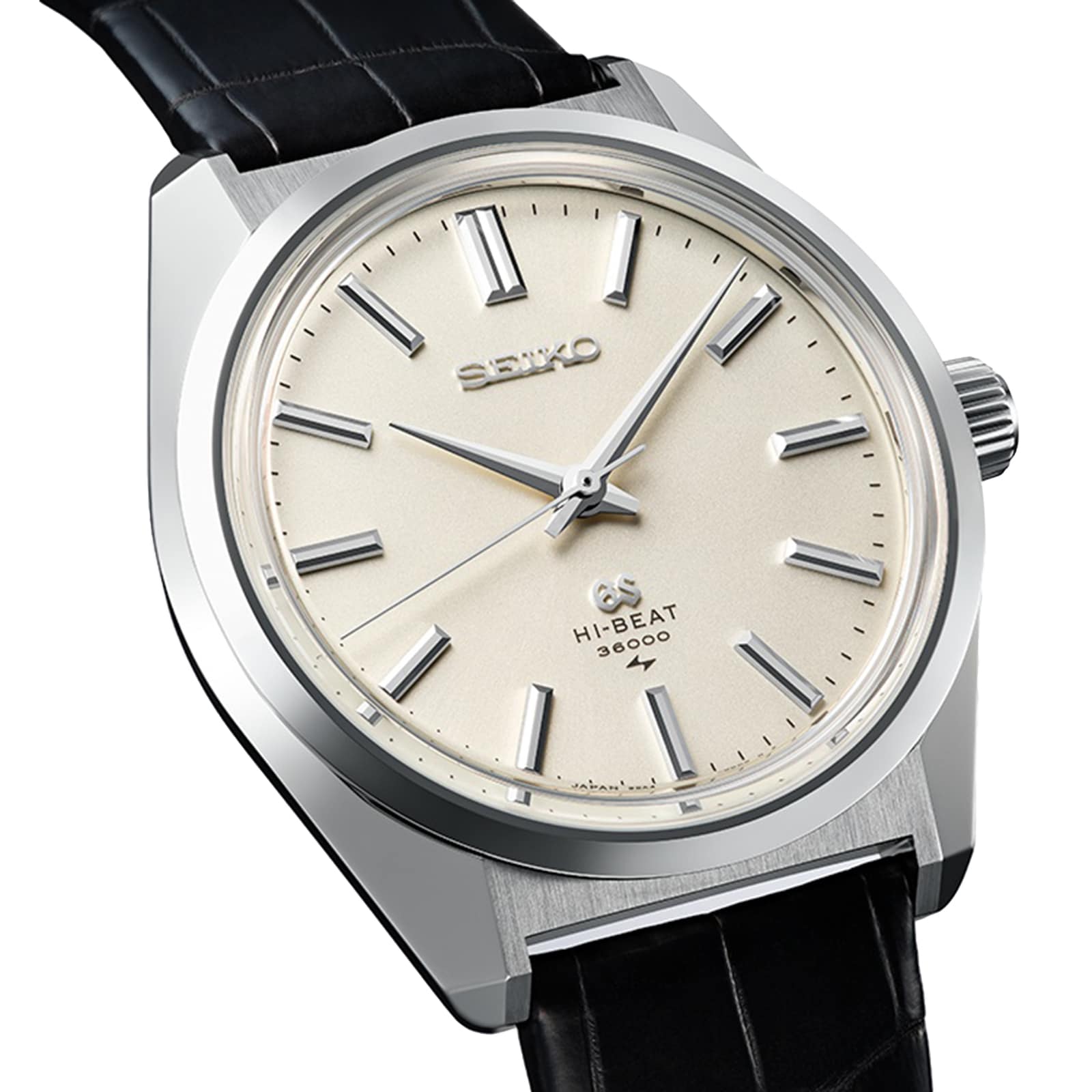 A close-up of the Grand Seiko Manual Hi-Beat Heritage, featuring a cream dial, silver indices, and a black leather strap, highlights its signature high-beat movement.