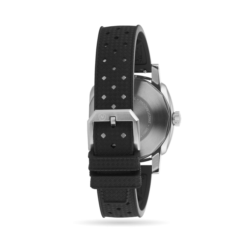 Stainless steel watch with black dial, Roman numerals, date window, and black textured rubber strap shown from side view.