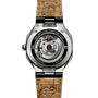 Back view of the ID Geneve Circular 1 - Mineral Grey wristwatch showcasing its visible mechanical movement and cork-patterned strap.